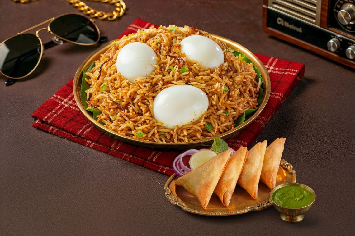 Egg Biryani And Chicken Patti Samosa Combo
