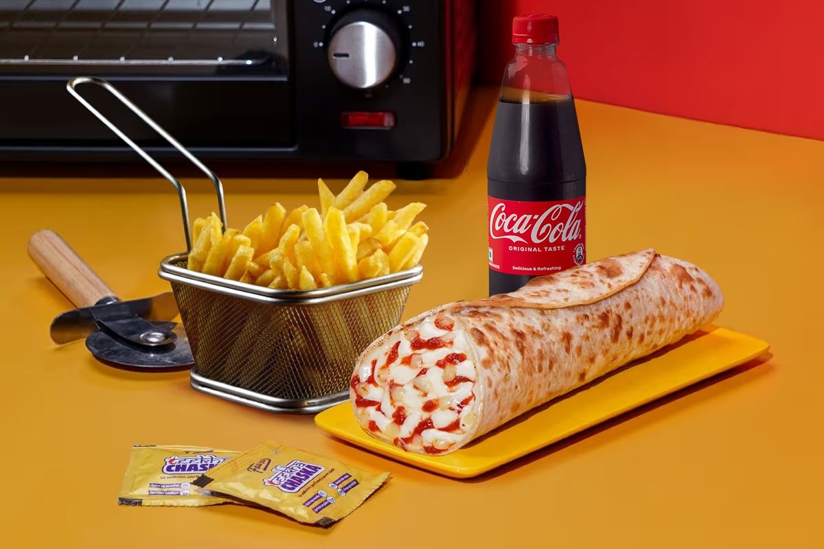 Veg Pizza Wrap With Side And Beverage Meal