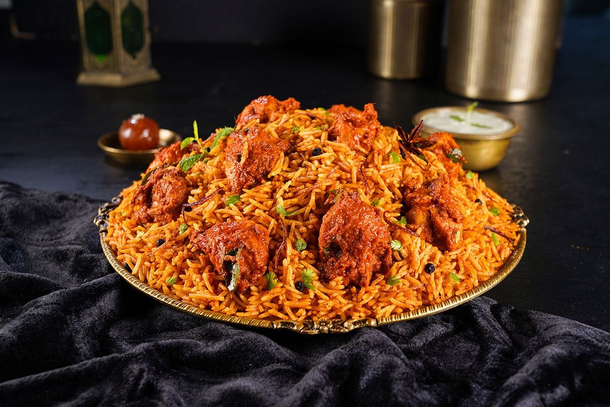 Hyderabadi Daastan-e-Ghee Murgh Biryani (Ghee Roast Chicken)(Spicy)